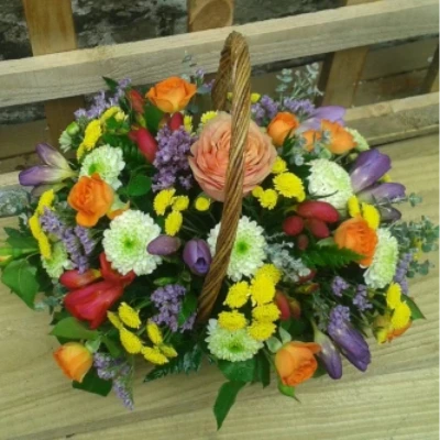 Moments Basket - Basket of seasonal and long lasting flowers.