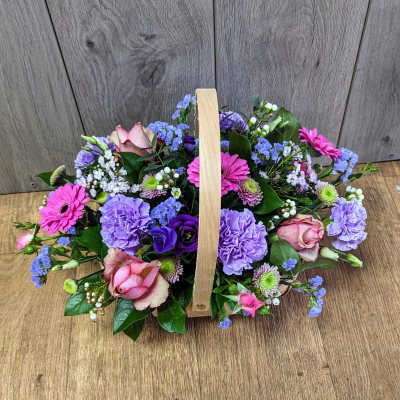 Happy Thoughts - Make their day with a pretty basket of flowers arranged using a selection of favourite pastel-coloured flowers. Handcrafted by local artisan florists, only the finest buds and leaves are selected, ensuring flowers stay fresher for longer.