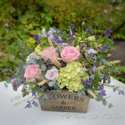 Home Sweet Home - A lovely mix of flowers and foliage reminiscent of happy days in the garden, all arranged in a stylish container. Perfect for any occasion.