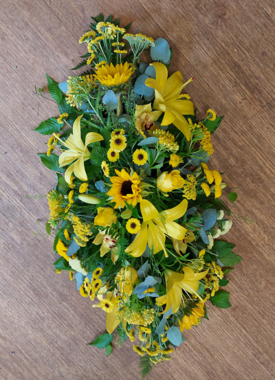 Yellow single ended spray - Traditional single ended spray in oasis made in yellow and white flowers. At The Flower Box we are delighted to present this product available for flower delivery in Knighton and surrounding areas and surrounding areas.