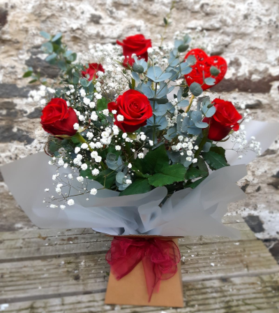 Classic Half Dozen Flower Box - A dozen red roses, with gypsophila flower surrounded by beautiful green shades of foliage presented in our always popular Flower Box