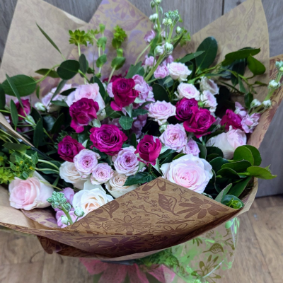 Scented Pink Romance - beautiful shades of pinks roses with scented stocks make this bouquet pure scented romance.
Presented in our signature flower Box design.